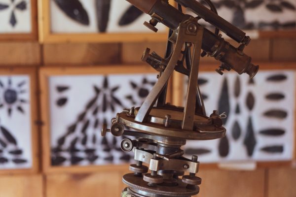 brown metal sextant